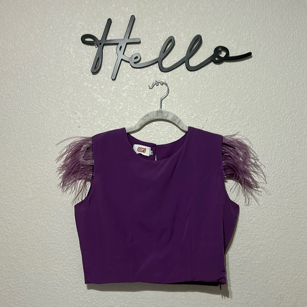 Crop top with sleeve feather detail